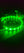Cat glowing in yard with LED safety collar